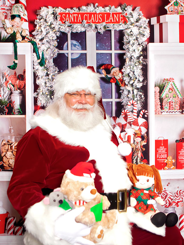 Santa Scott O'Neil Sitting with Christmas Toys